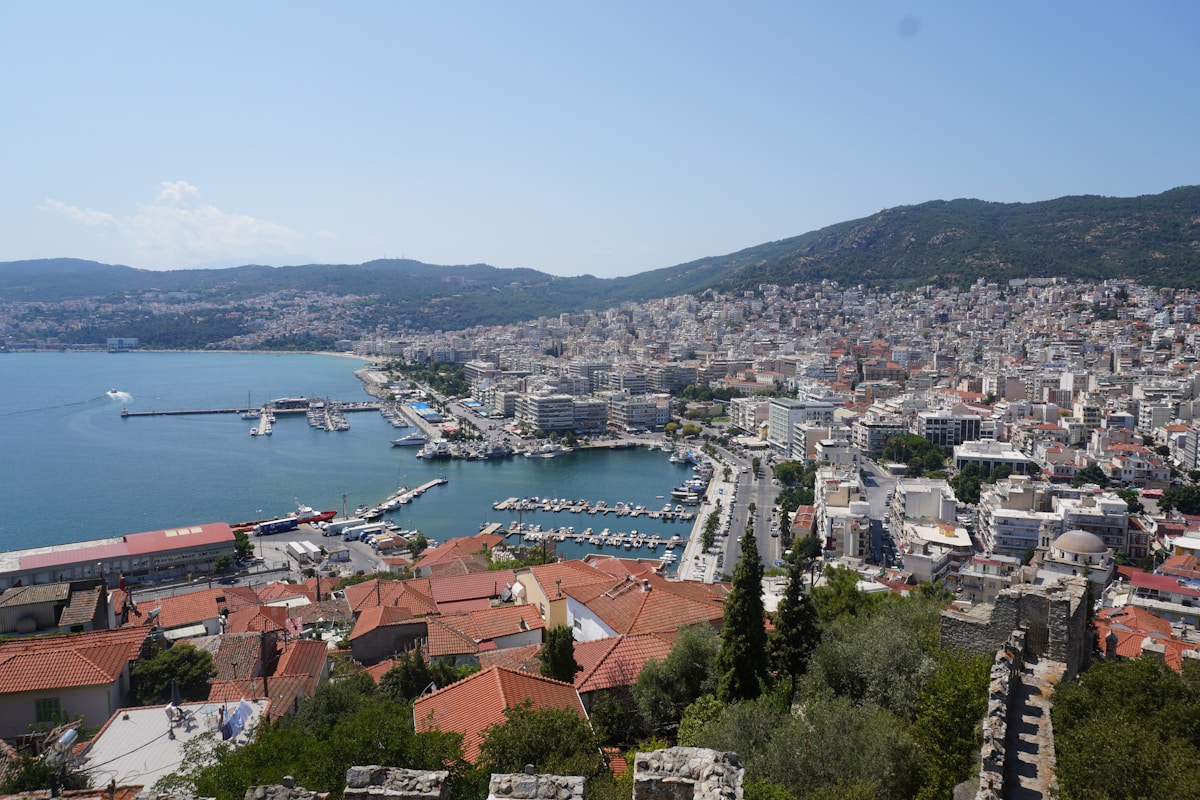 Kavala harbour and city from above, with the Panagia peninsula and sea, Greece