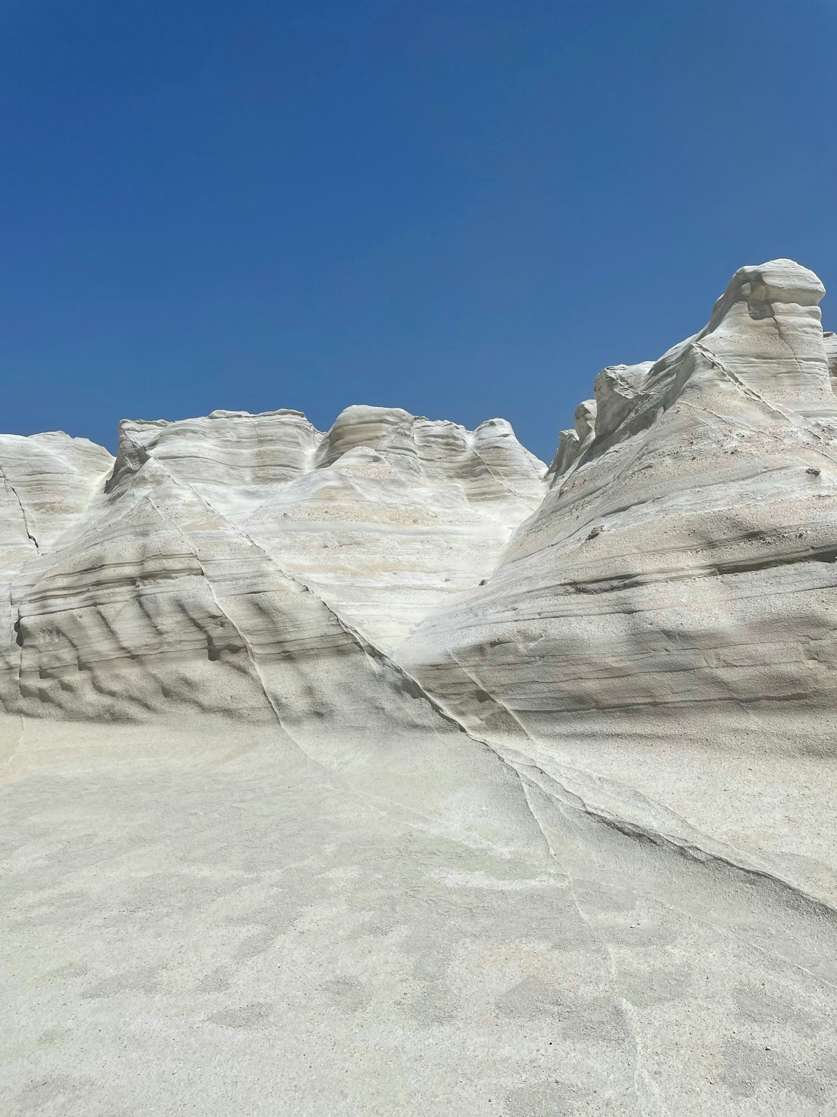 White volcanic rock formations at Sarakiniko beach on the island of Milos, Greece