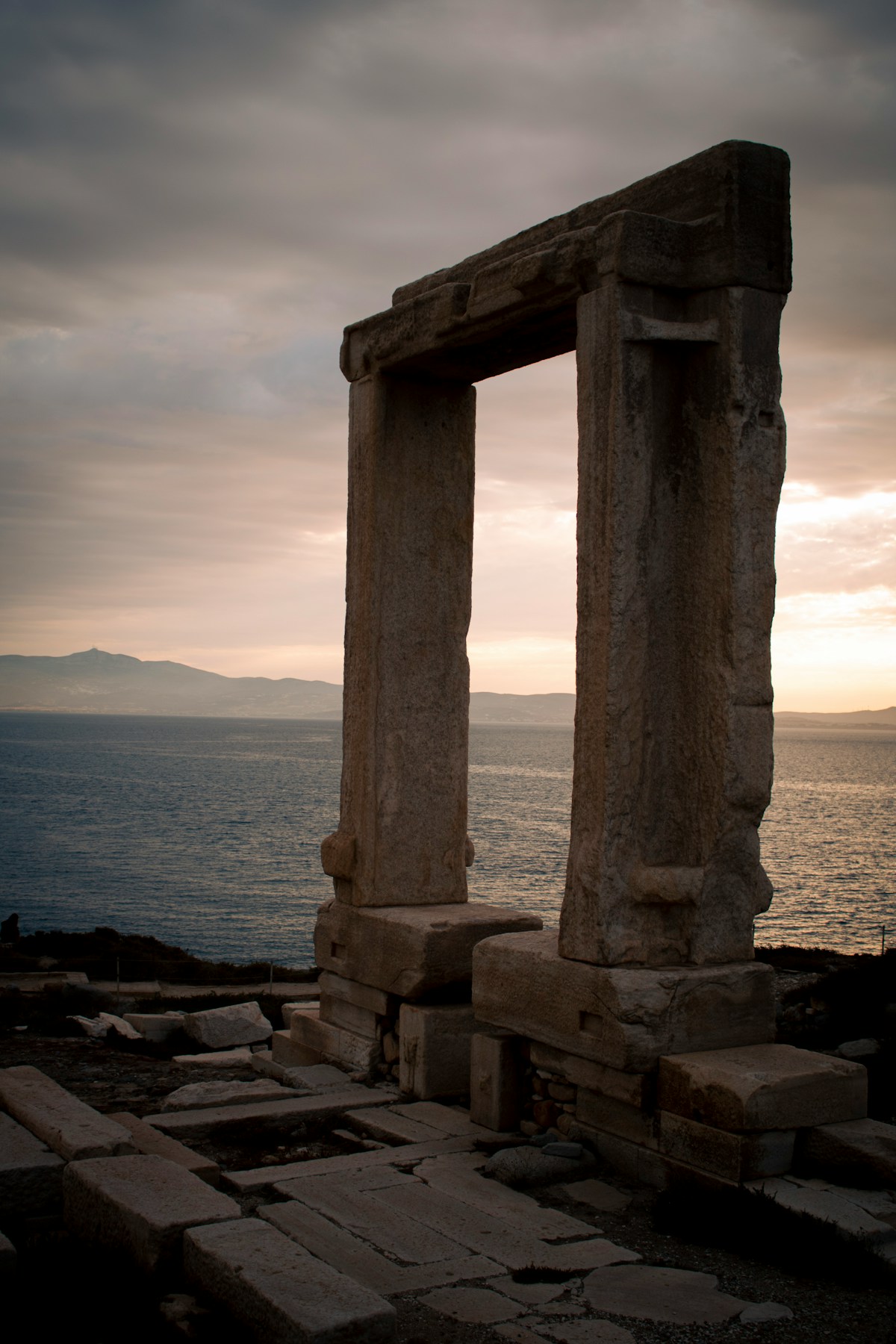 Portara marble gateway of Naxos overlooking the Aegean Sea at sunset