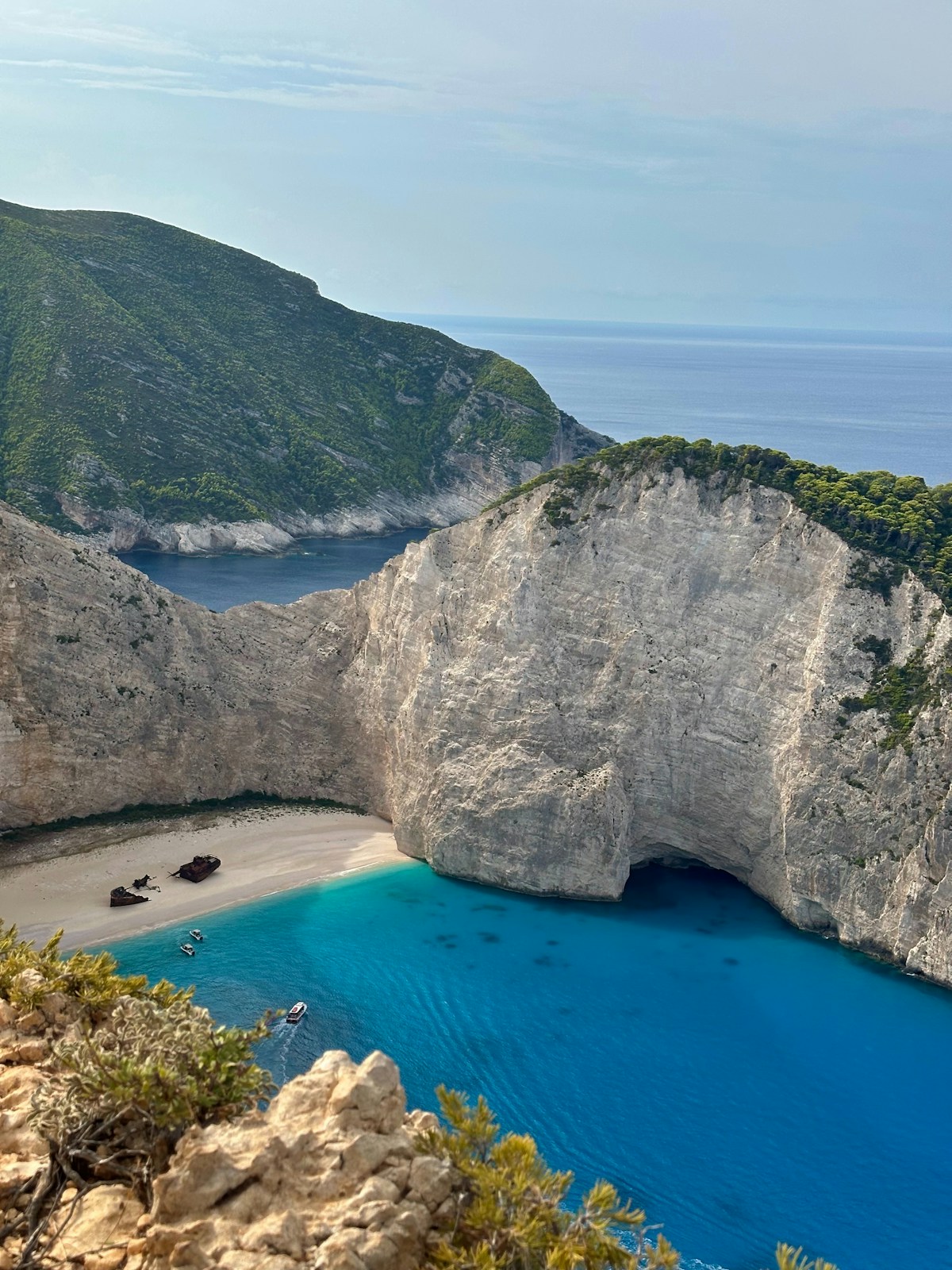 Navagio Shipwreck Beach with turquoise water and white cliffs, Zakynthos, Greece