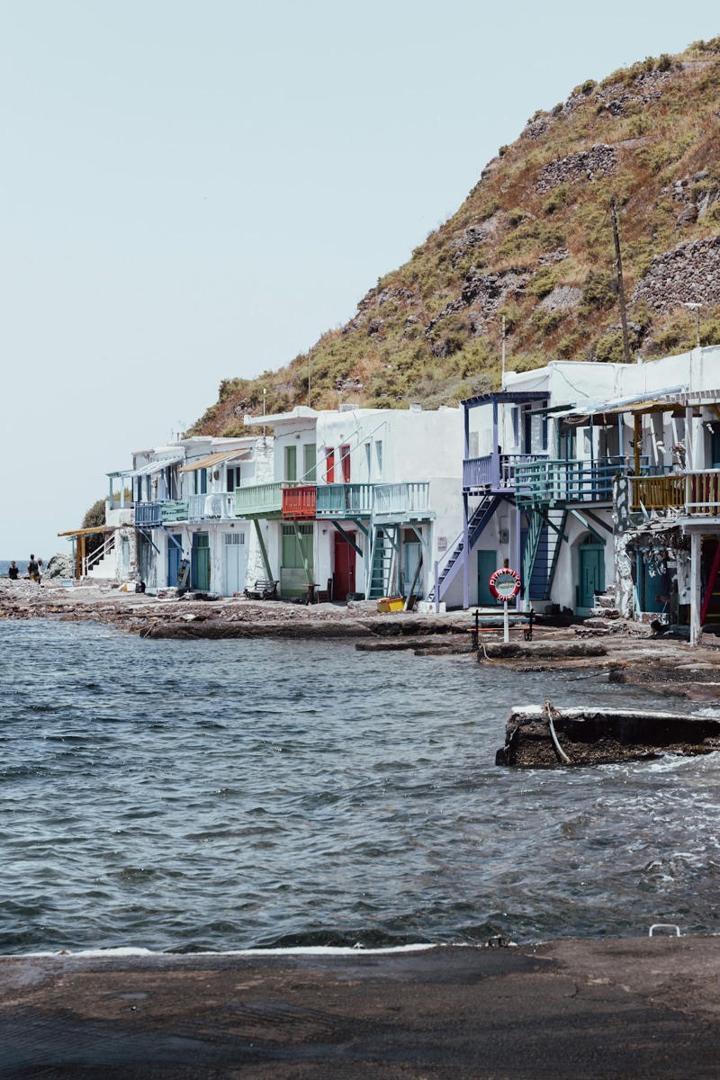 Colourful syrmata boat houses on the waterfront at Klima village, Milos, Greece