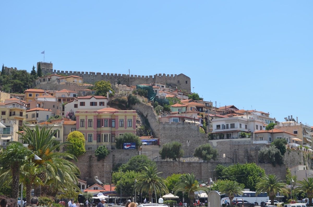Kavala's Byzantine castle walls cascading down the hillside above the old town and harbour, northern Greece