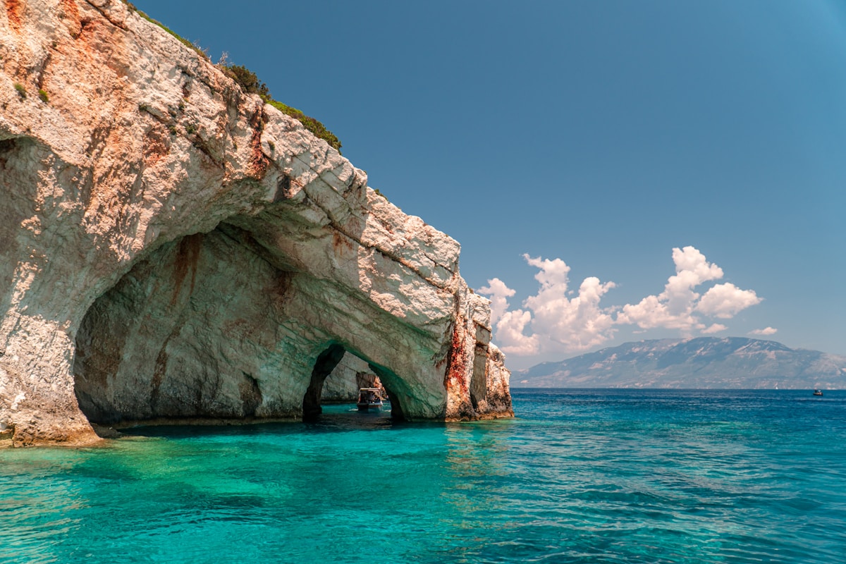 Blue Caves rock arches over turquoise water, Zakynthos, Greece